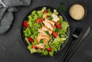 Incorporating leafy greens in your diet can be as simple as adding them to salads. (Image via Freepik)